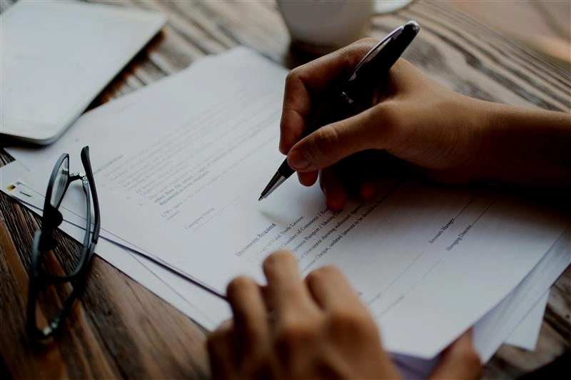 Signing cremation service authorization form